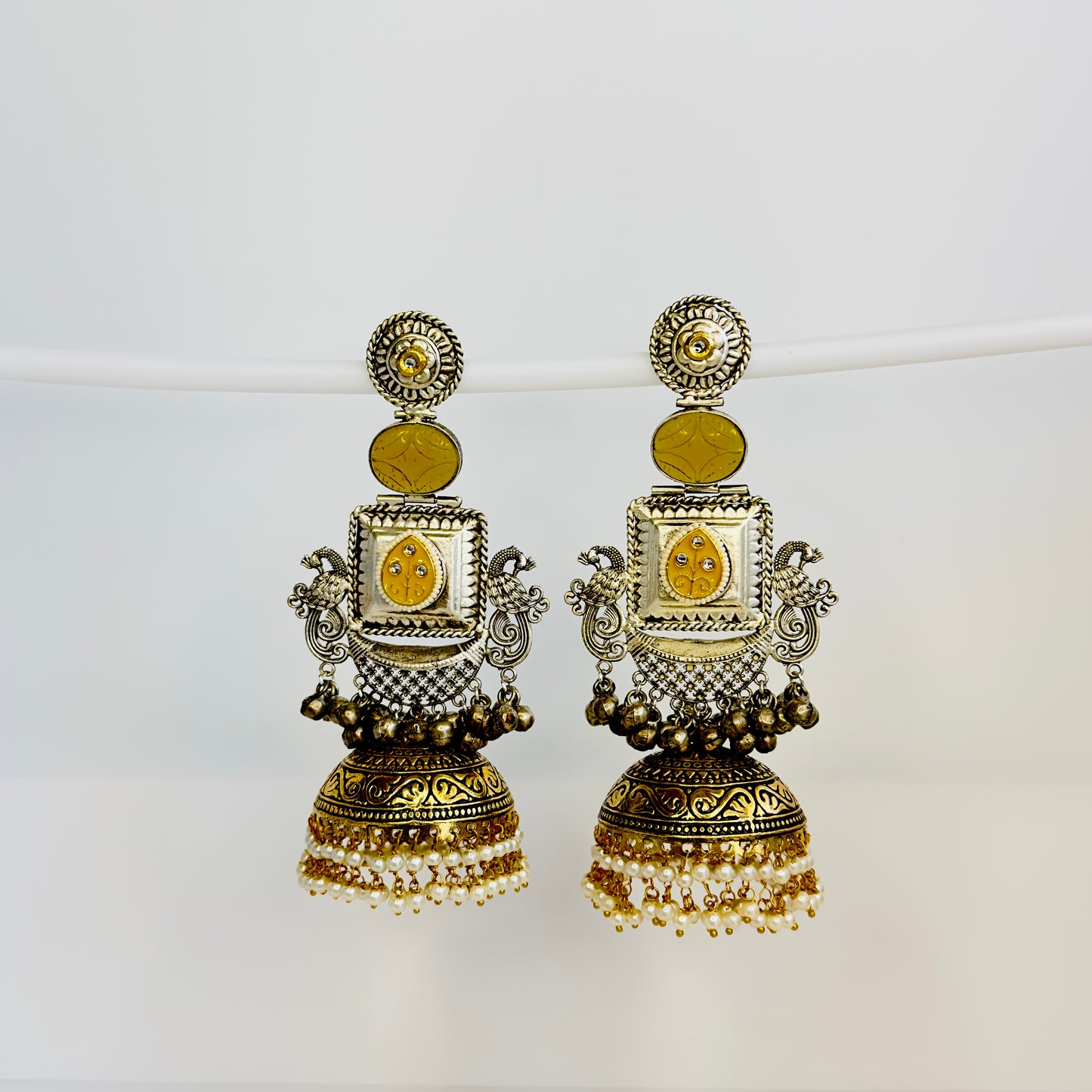 Dual Tone Peacock Jhumka Earrings