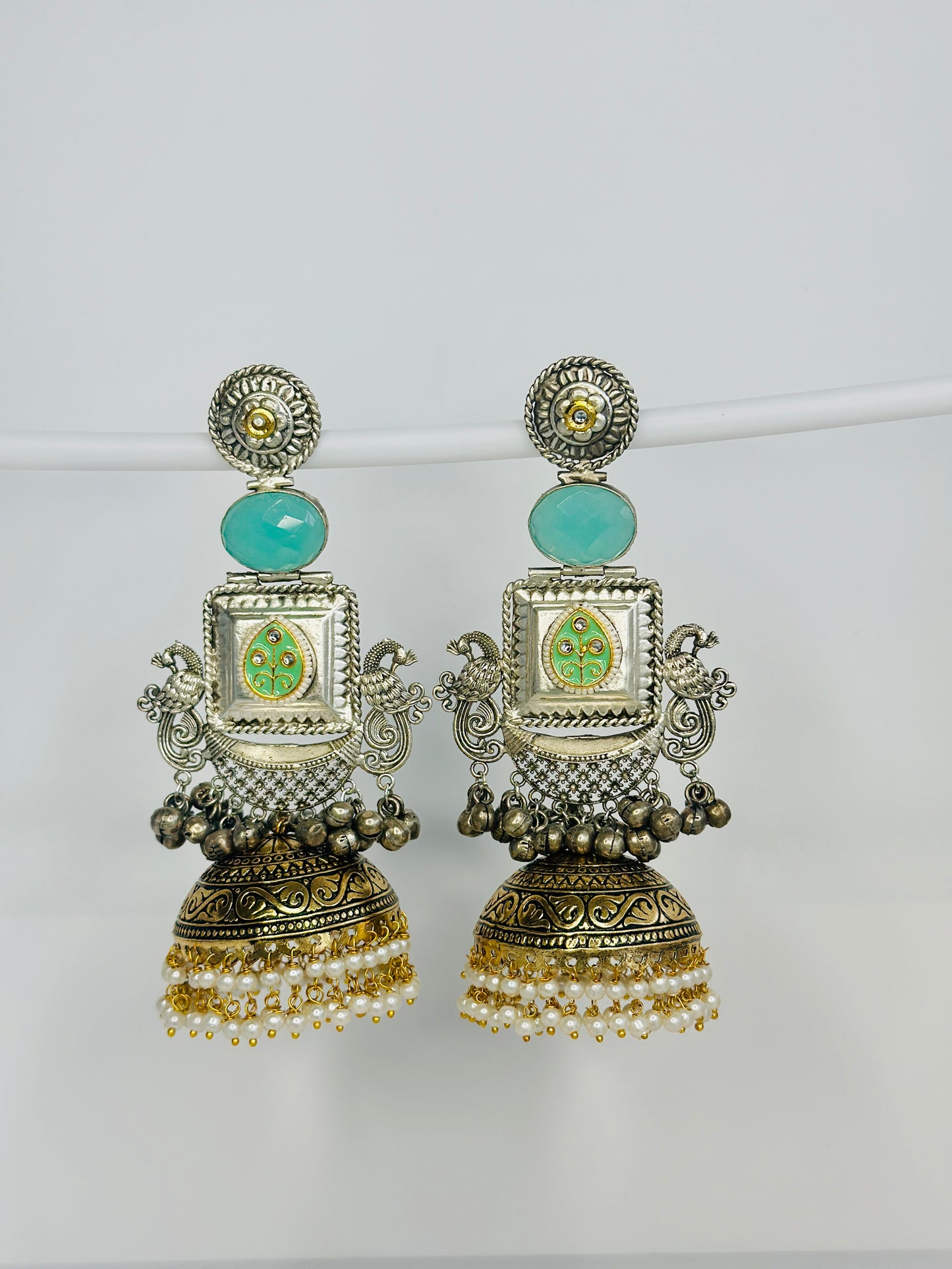 Dual Tone Peacock Jhumka Earrings