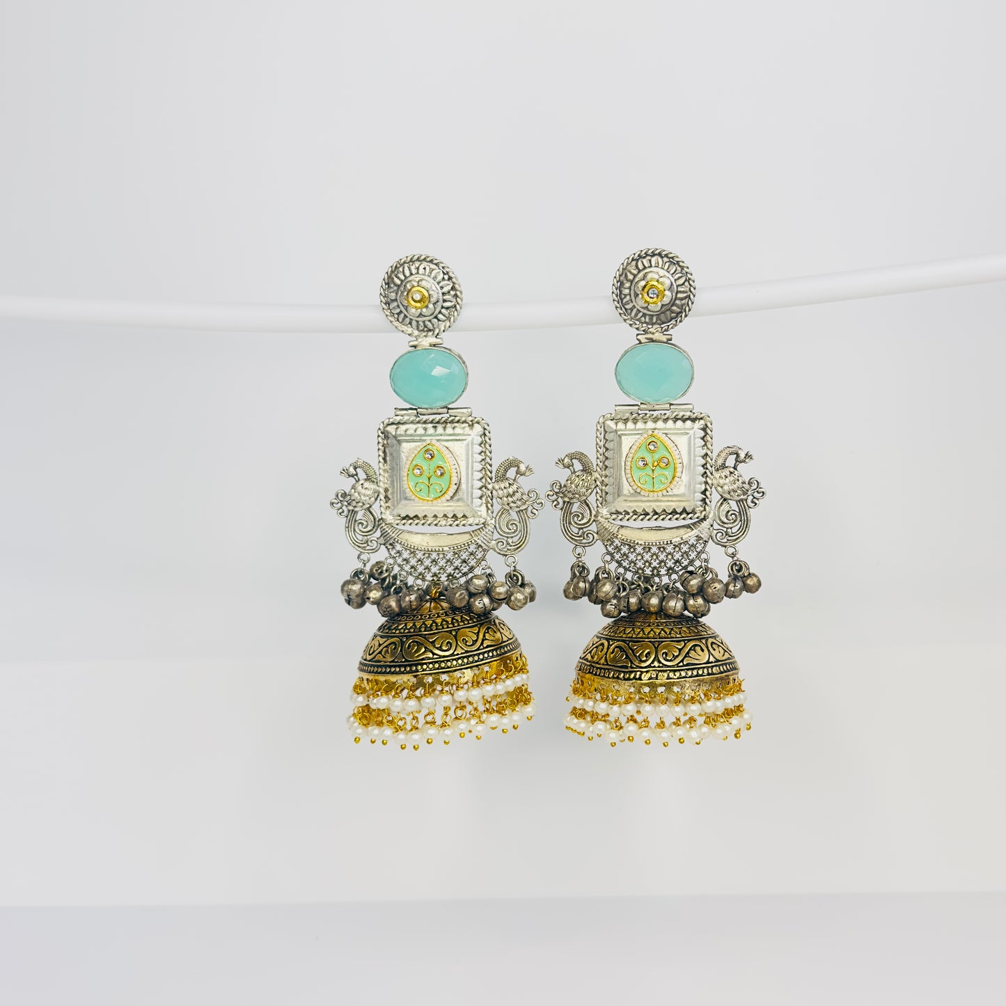 Dual Tone Peacock Jhumka Earrings