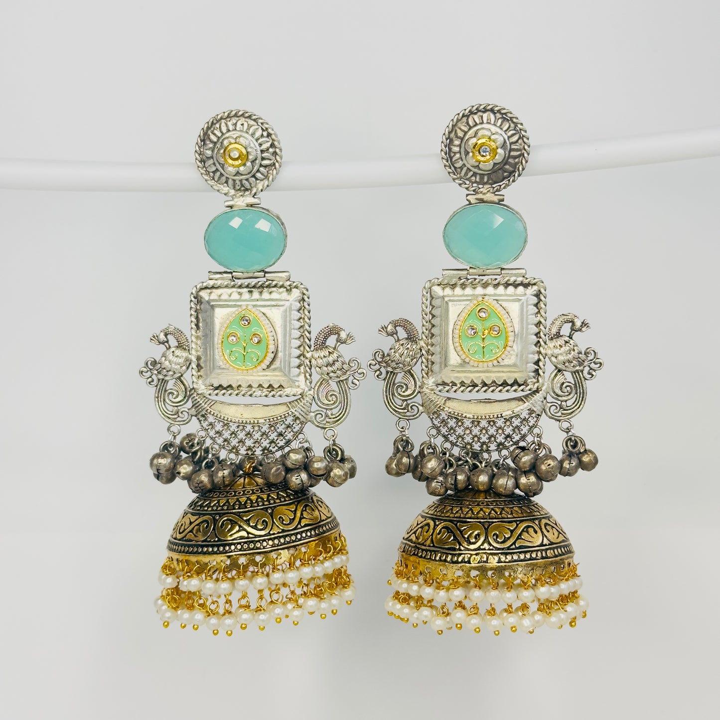 Dual Tone Peacock Jhumka Earrings
