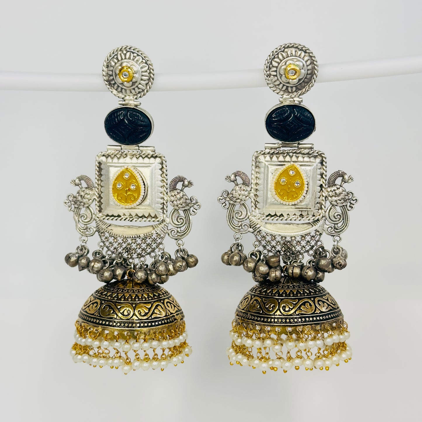 Dual Tone Peacock Jhumka Earrings