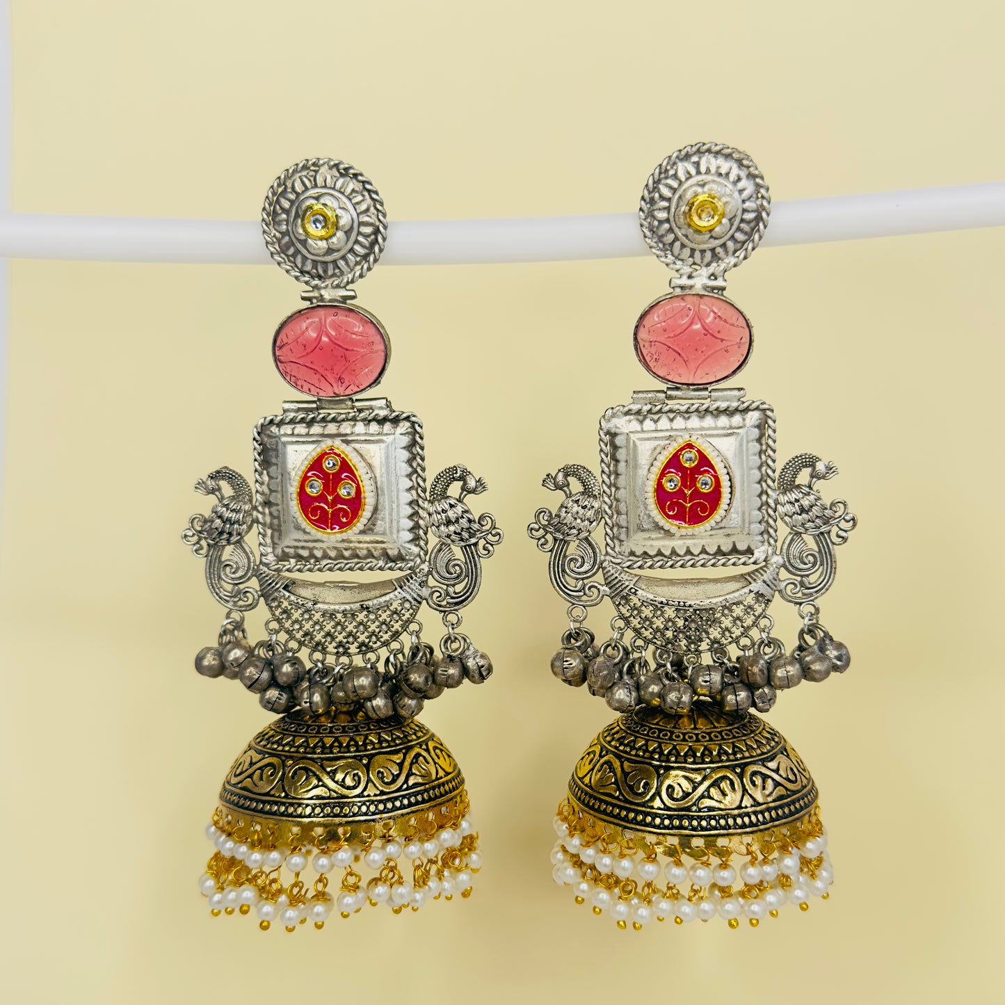 Dual Tone Peacock Jhumka Earrings