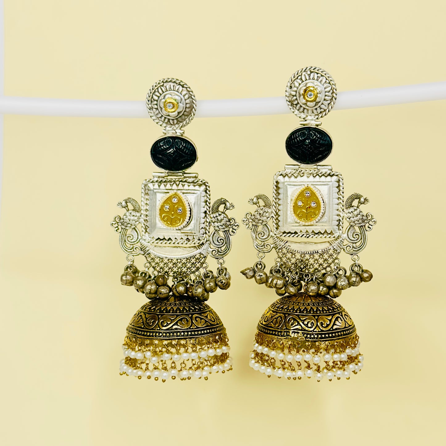 Dual Tone Peacock Jhumka Earrings