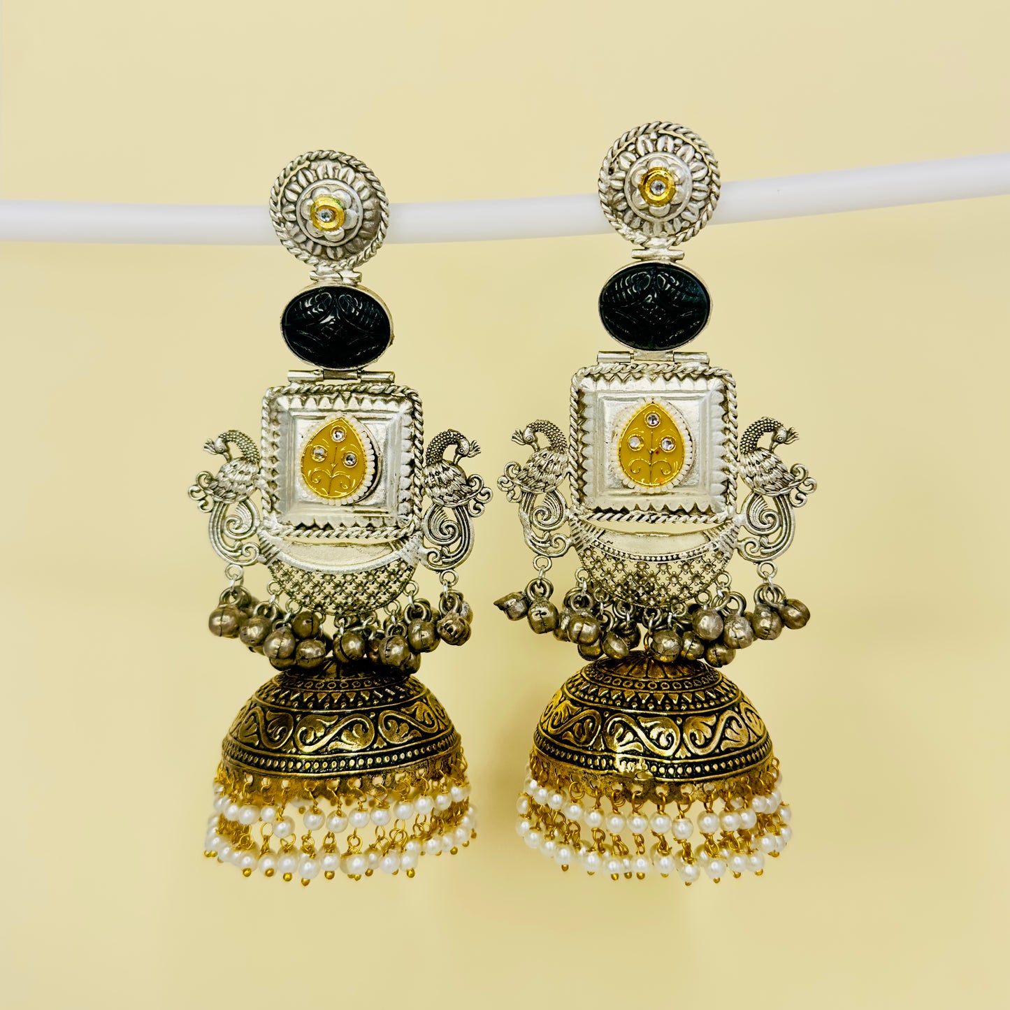 Dual Tone Peacock Jhumka Earrings