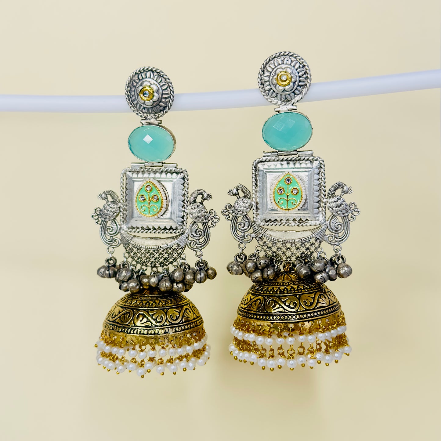 Dual Tone Peacock Jhumka Earrings