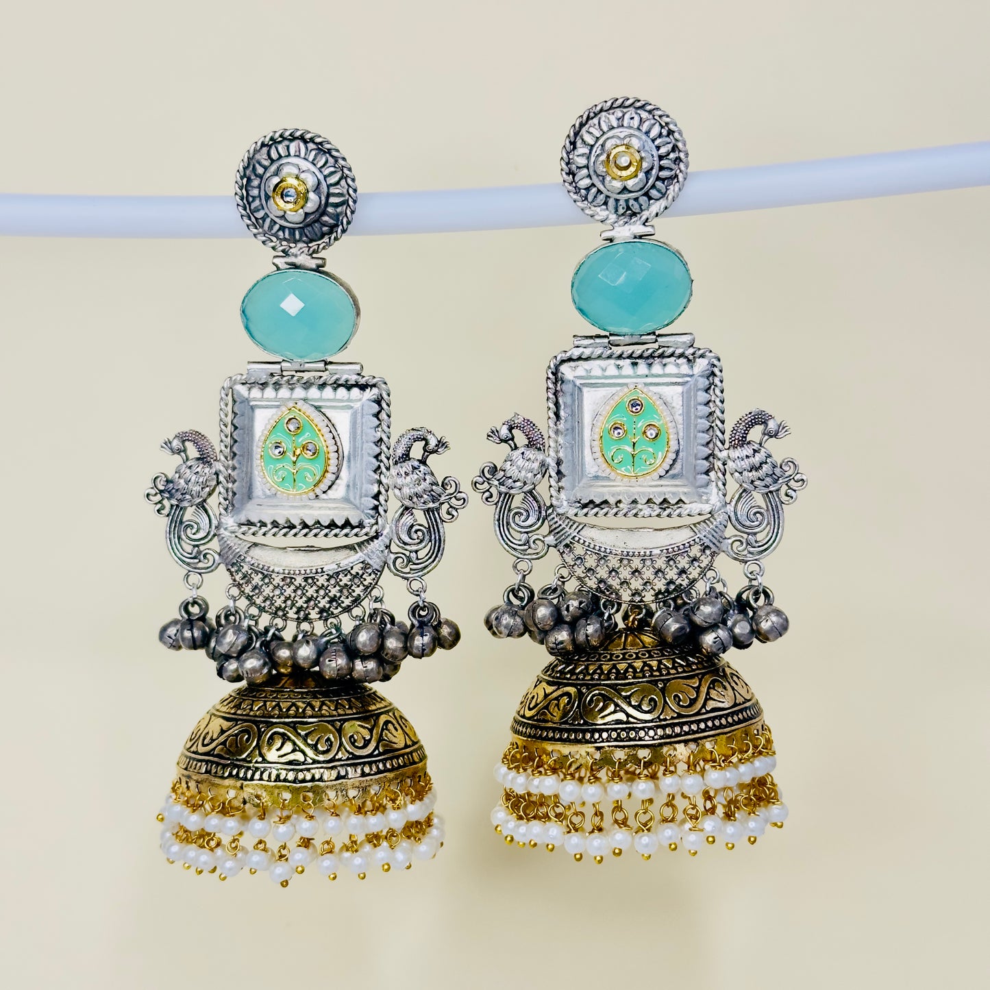 Dual Tone Peacock Jhumka Earrings