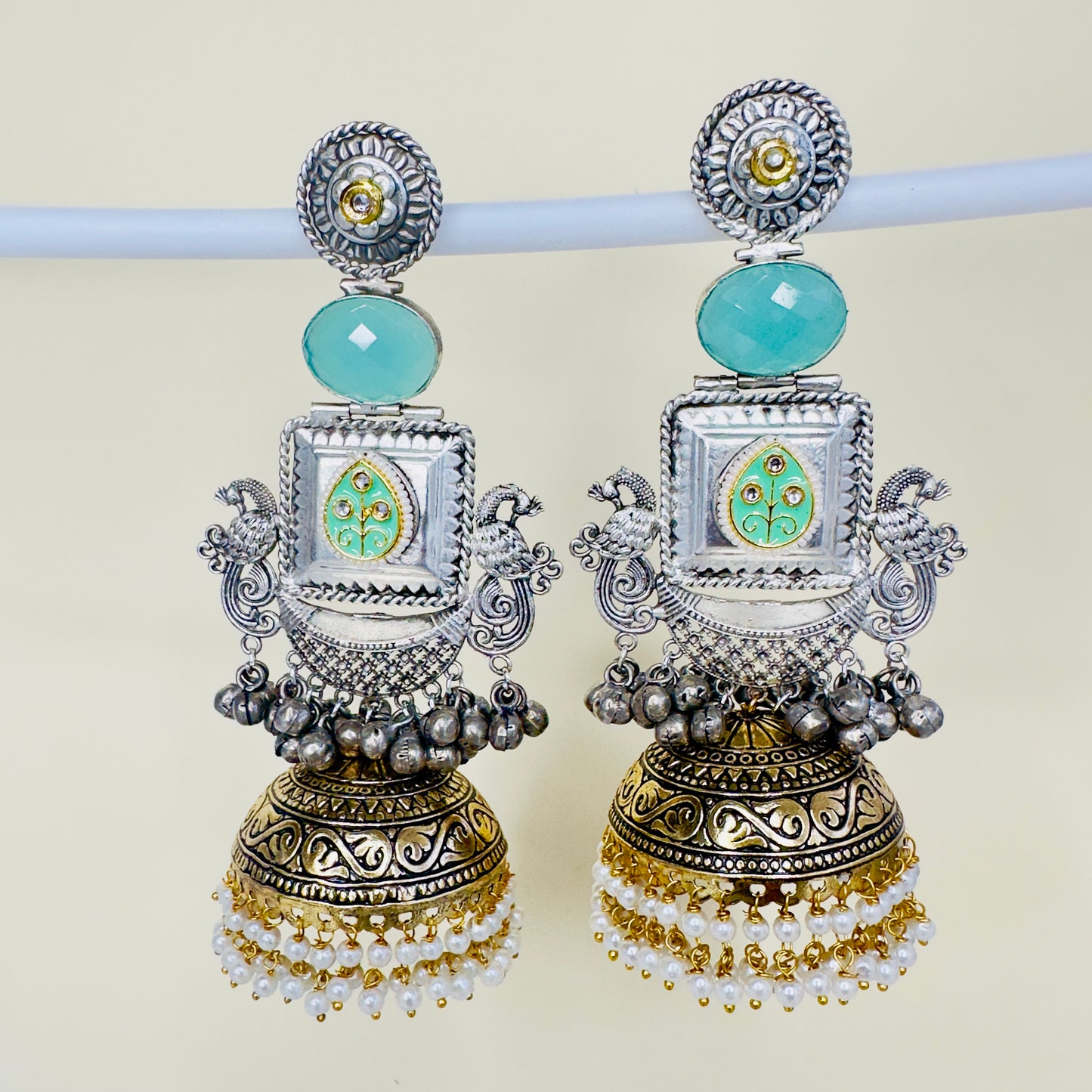 Dual Tone Peacock Jhumka Earrings