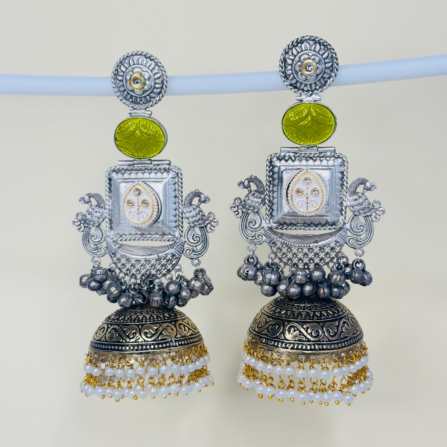Dual Tone Peacock Jhumka Earrings