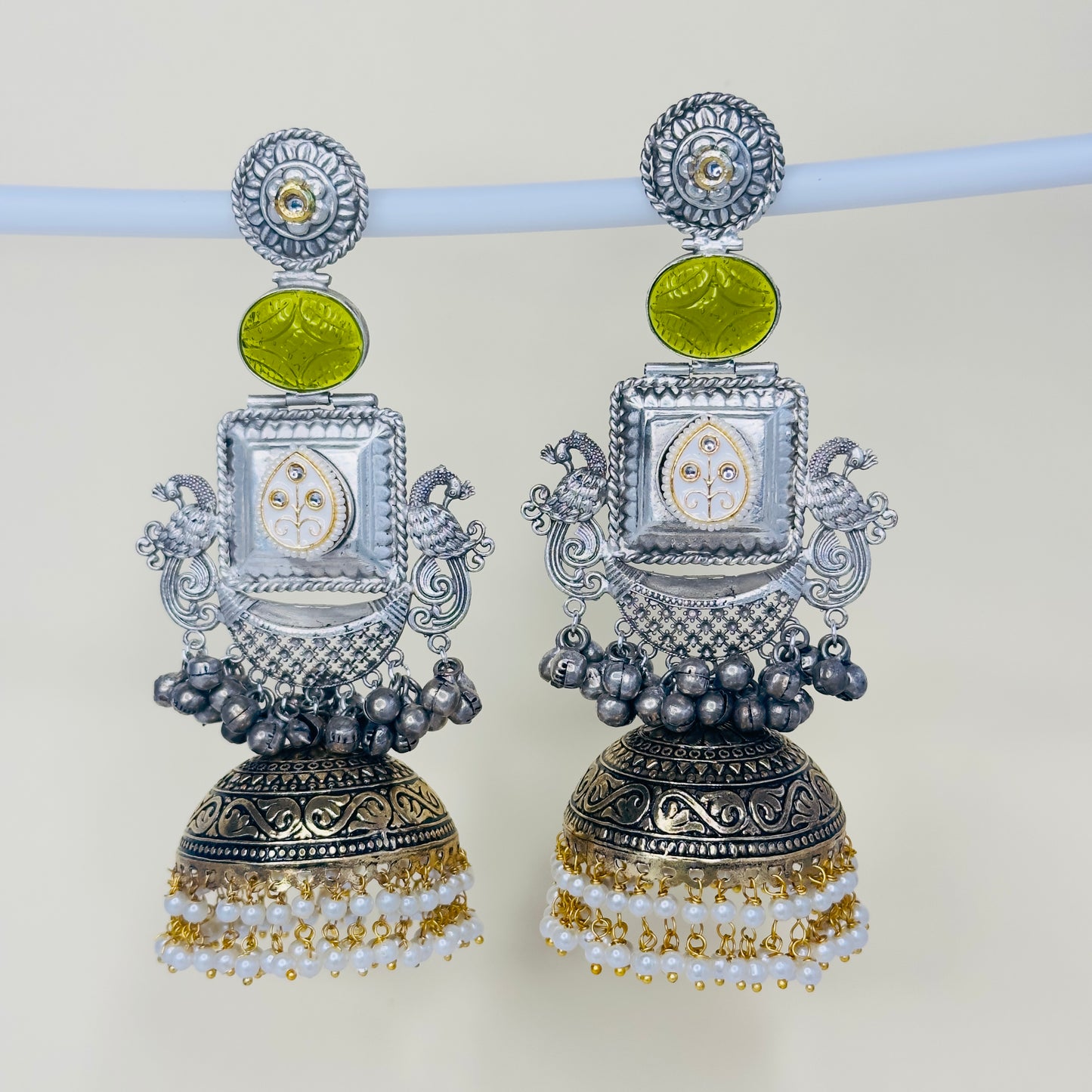 Dual Tone Peacock Jhumka Earrings