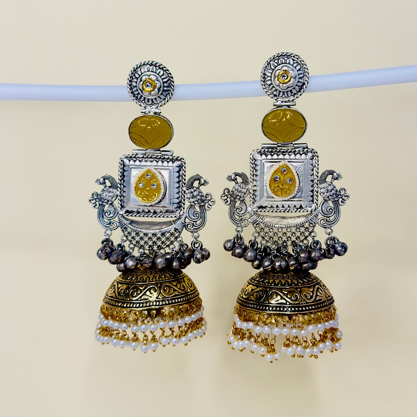 Dual Tone Peacock Jhumka Earrings