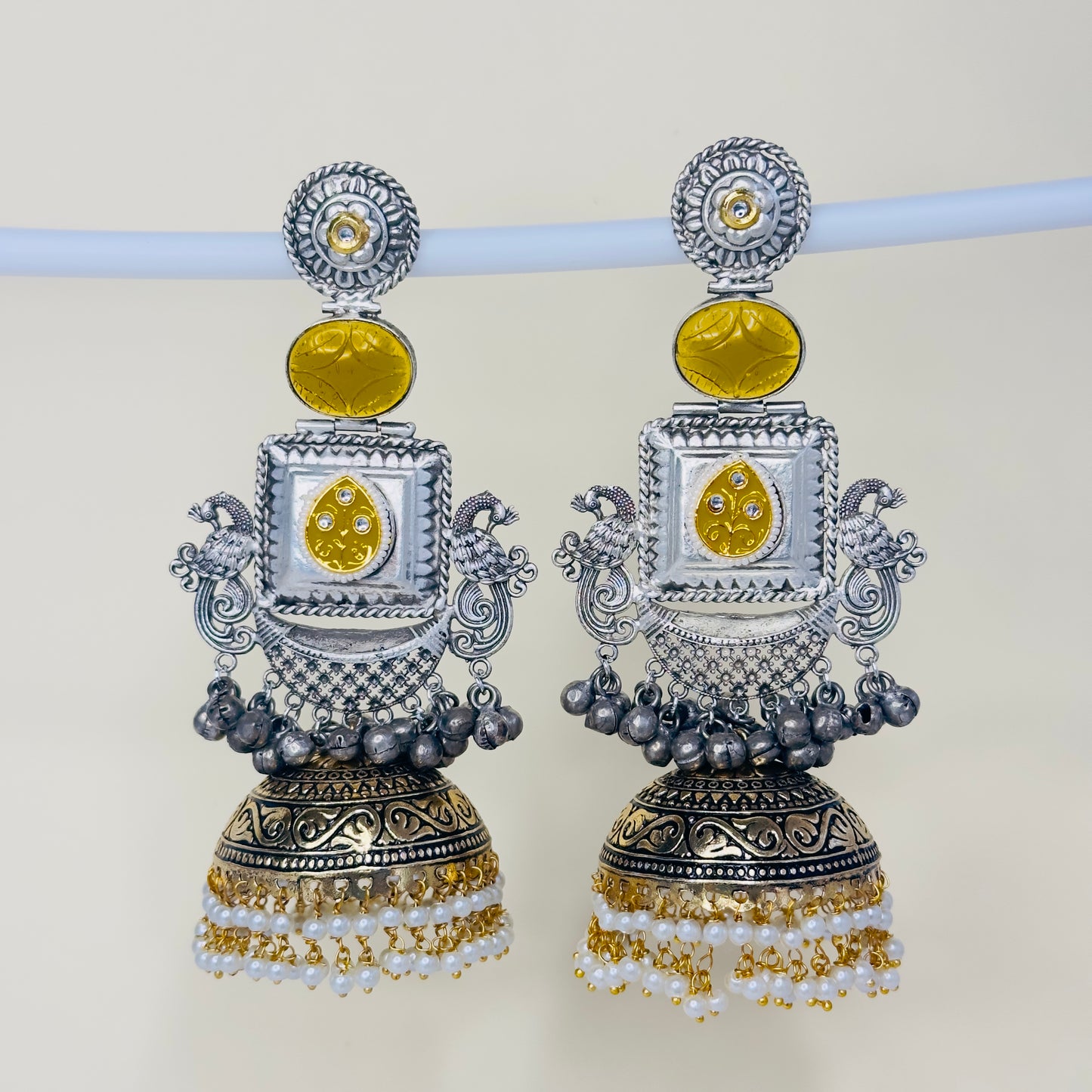 Dual Tone Peacock Jhumka Earrings