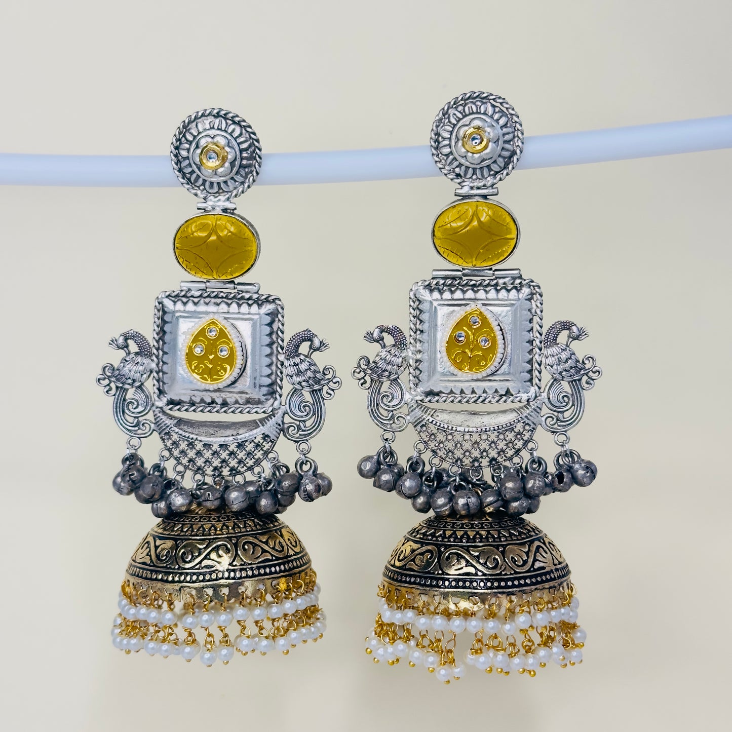 Dual Tone Peacock Jhumka Earrings