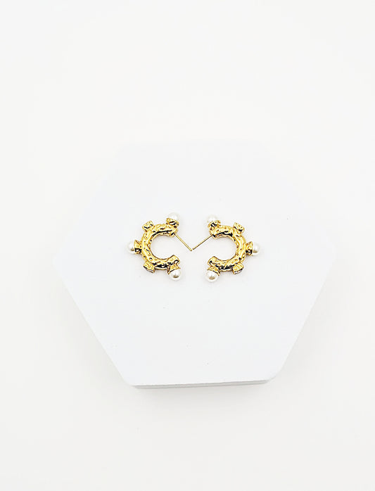 Irregularly shaped semi circular pearl diamond set with stainless steel gold plated earring