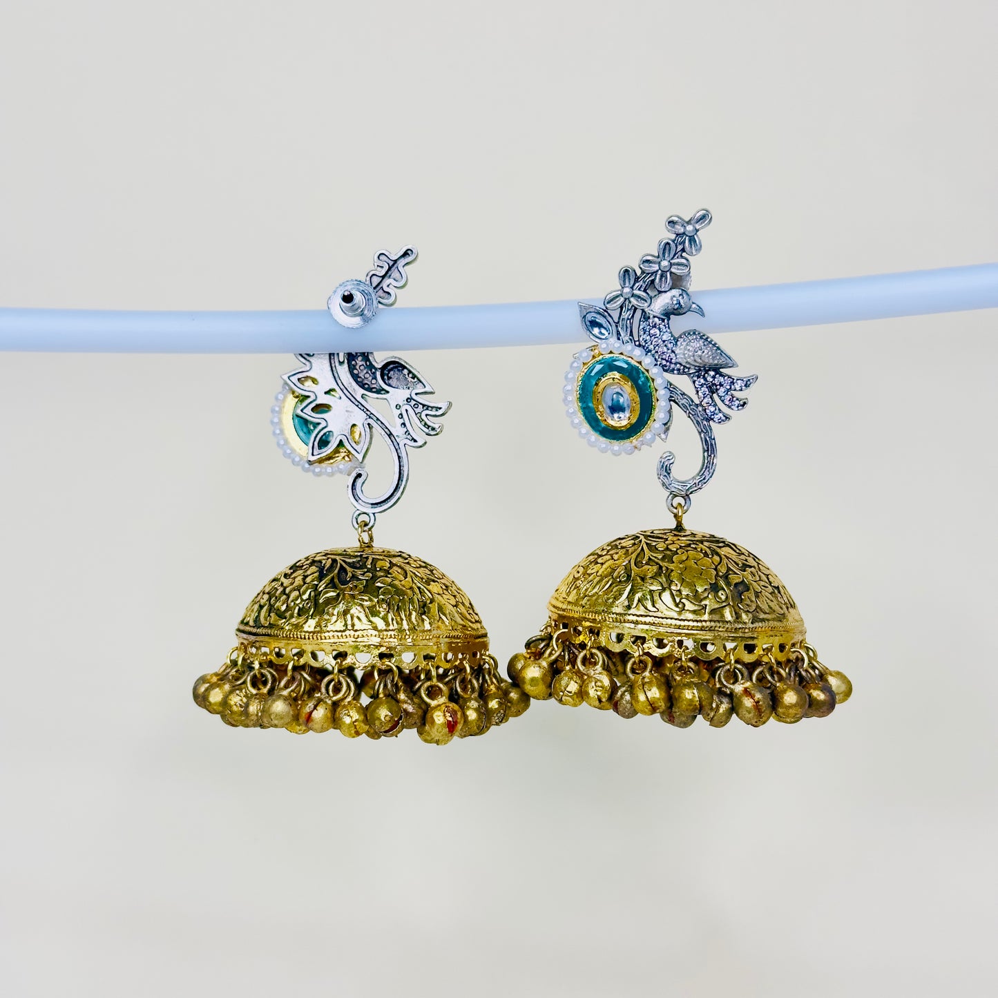 Dual Tone AD Peacock Jhumka Earrings