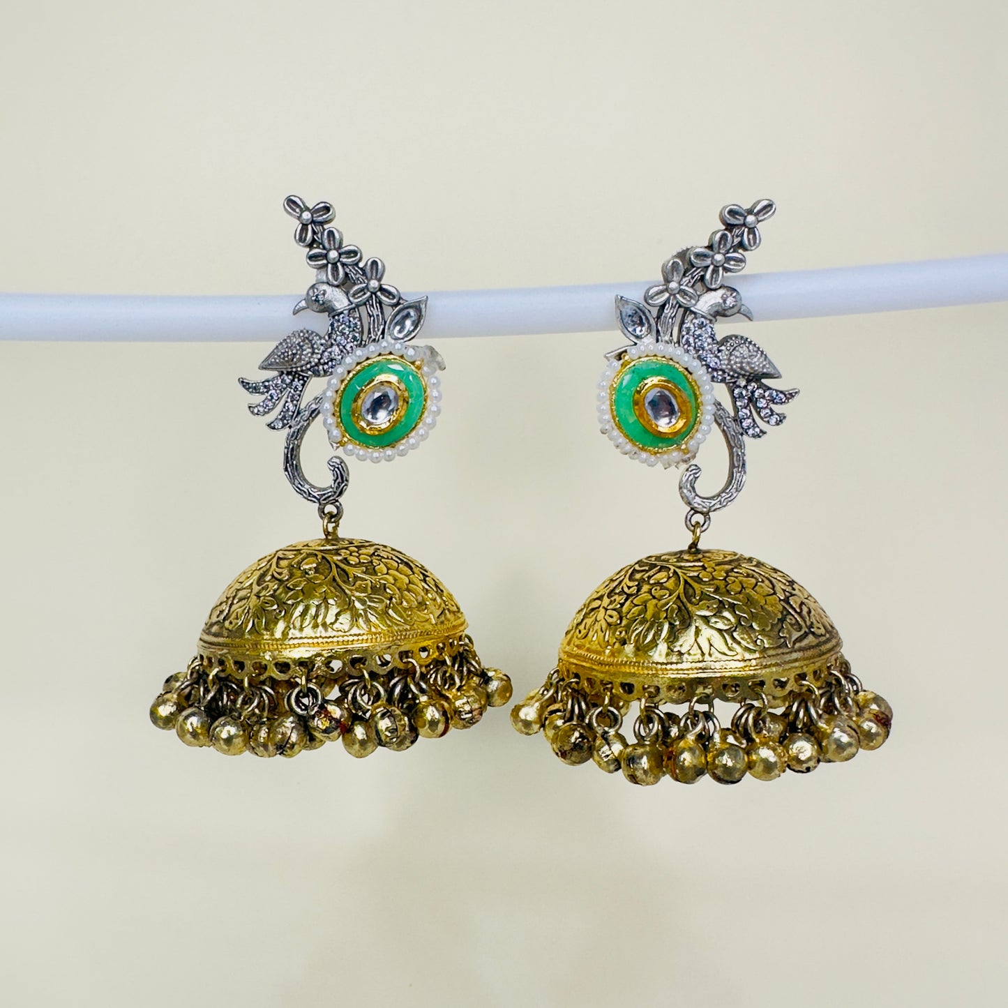 Dual Tone AD Peacock Jhumka Earrings