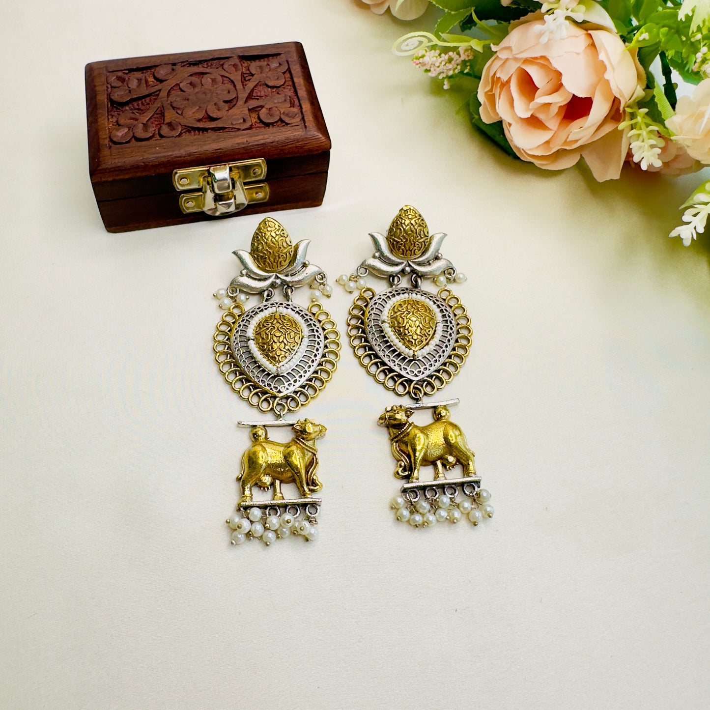 Nandi Motif Dual Tone earrings