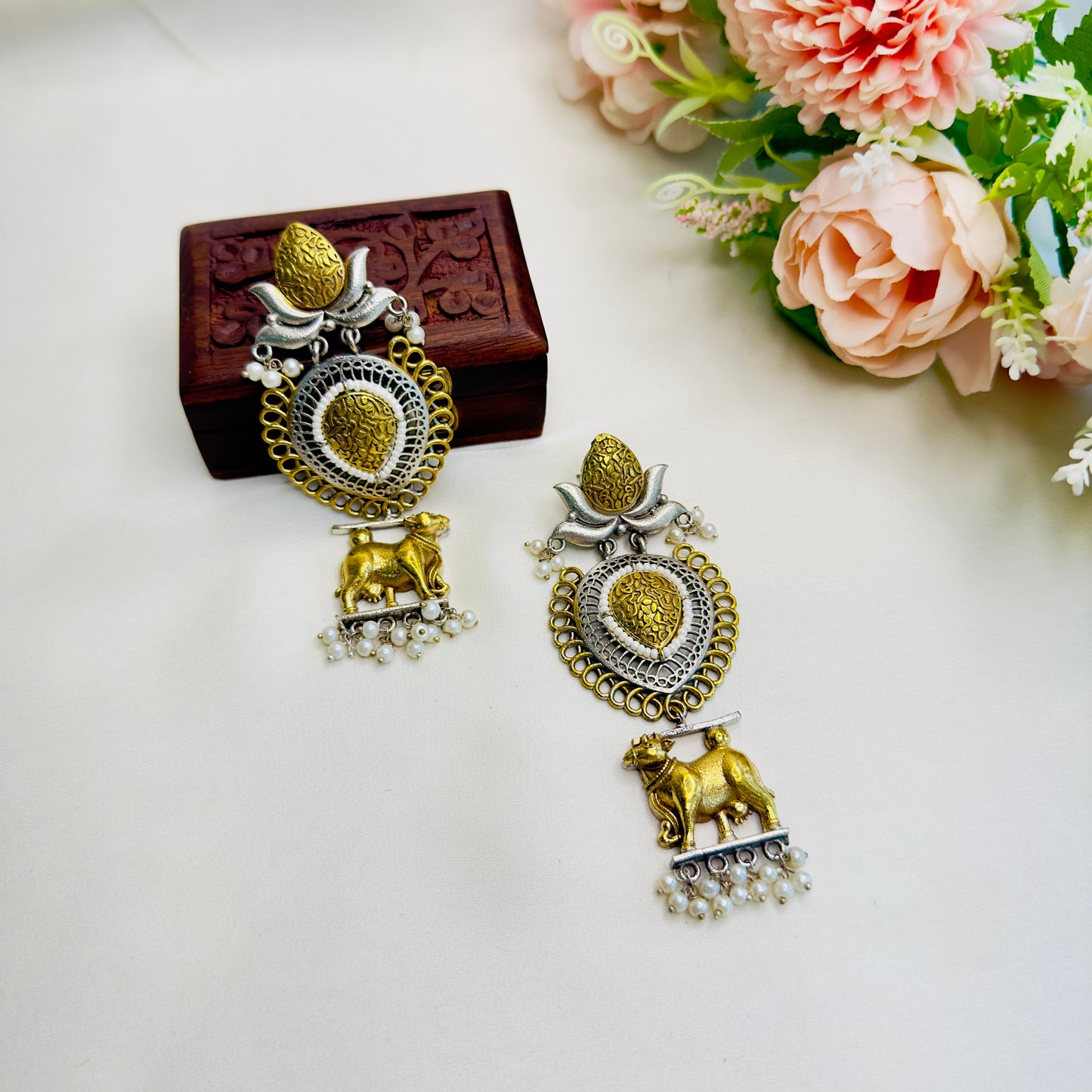 Nandi Motif Dual Tone earrings