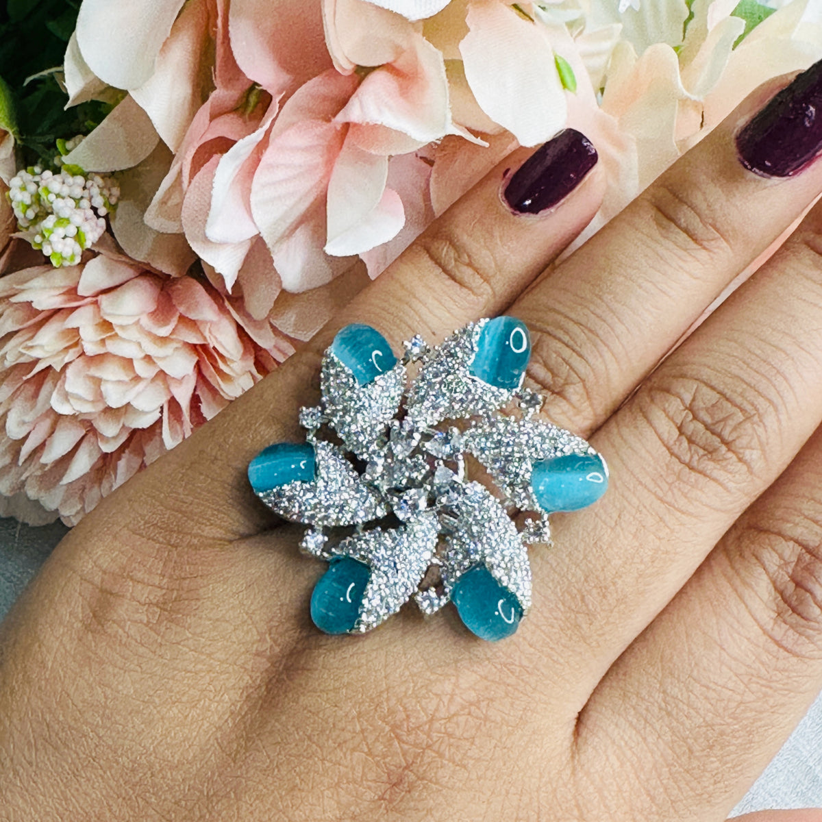 Stridhan Turquoise American Diamond studded Flower Ring